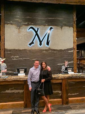 Dave Drouillard with his wife, Ana Paula, at the reception area of The Mineshaft. 