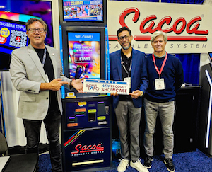 Sacoa Team with the K4 Kiosk Winner product. From left to right: Sebastian Mochkovsky, Gustavo Viloria and Jorge Gambini.