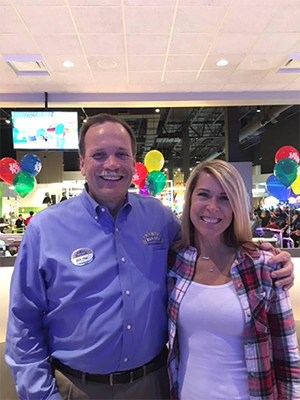 Main Event’s VP of Operations Wayne Stancil with Rachelle Granger, Intercard sales, at the Main Event – Olathe grand opening party