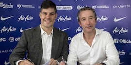 Player Jamie Mackie and coach Les Ferdinand