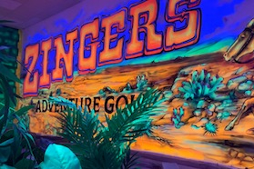 The course now features life-sized, UV props